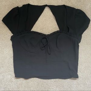 Very pretty black top with a cutout back